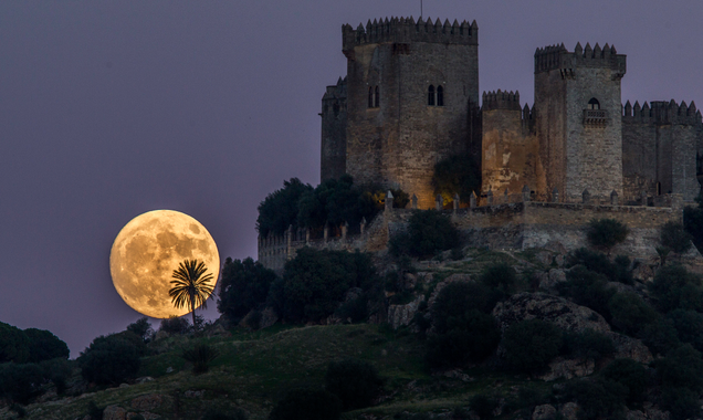 Moon rising behind the castle of Almodovar in Cordoba, Spain. Image: Miguel Morenatti/AP